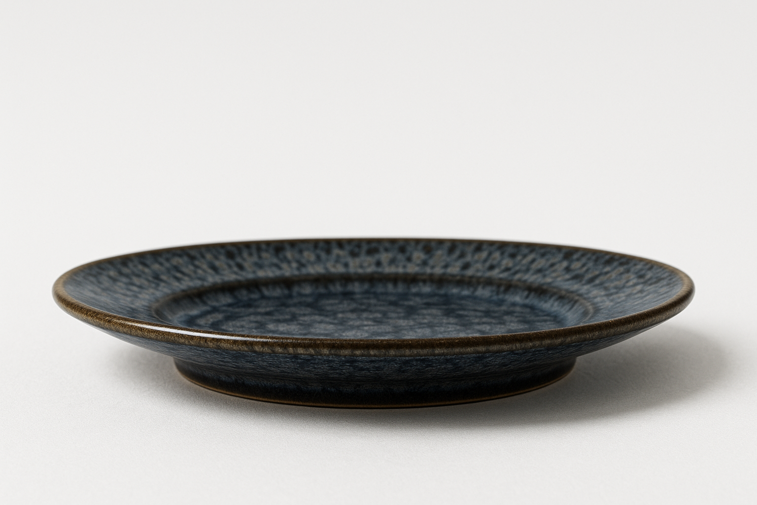 Handmade Ceramic Quarter Plate with Dark Blue Glaze – Textured Design